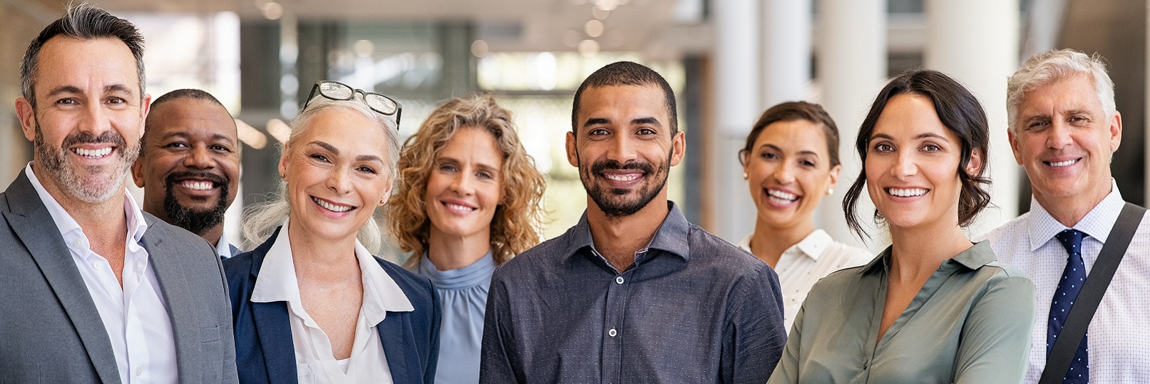 Professionals smiling at camera